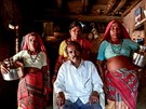 Sakharam Bhagat, 66, poses with his wives, Sakhri, Tuki and Bhaagi (L to R)...