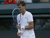 esk tenista Tom Berdych pedvd zajmavou grimasu v utkn 1. kola...