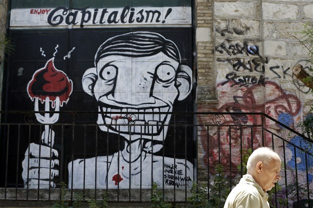 Graffitti v Aténách namí�ené proti kapitalismu.