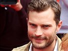 Herec Jamie Dornan na �erven�m koberci u hotelu Thermal.