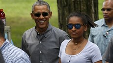 Americký prezident Barack Obama s mladí dcerou Sashou (18. ervence 2015).