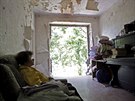 Obyvatelka Doncké oblasti ve svém rozstíleném byt (1. srpna 2015)