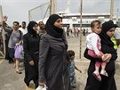 Uprchlíci na eckém ostrov Kos. ecká vláda pro n zídila nouzové stedisko...