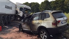 Tragická nehoda kamionu a BMW u Slaného.