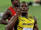 Usain Bolt po vítzství v bhu na 200 metr na MS v Pekingu.