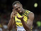 Usain Bolt slaví triumf v bhu na 200 metr na MS v Pekingu.