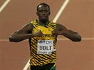 Usain Bolt (vlevo) probíhá vítzn cílem bhu na 200 metr na MS v Pekingu.