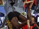 Usain Bolt pi sráce s ínským kameramanem.