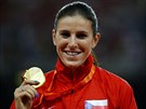 Zuzana Hejnová se chlubí zlatou medailí z mistrovství svta v Pekingu.