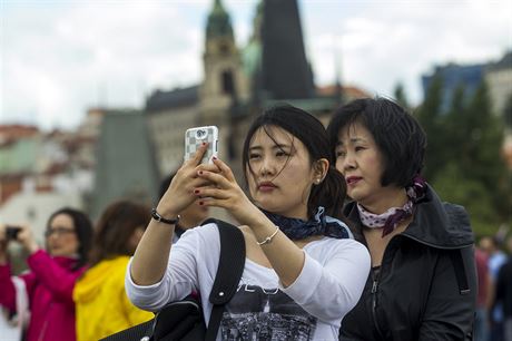 Turisté z Asie v Praze