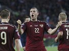 Ruský fotbalista Duba slaví gól v kvalifikaním zápase o Euro 2016 proti...