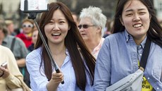 Turisté z Asie v Praze