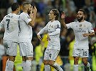 Fotbalisté Realu Madrid slaví gól proti achtaru Donck. Autor gólu Karim...