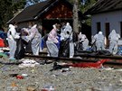 Dobrovolníci uklízí nepoádek po uprchlících v chorvatském mst Tovarnik (21....