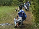 Uprchlíci v Chorvatsku smující za silného det k hranicím s Maarskem (24....