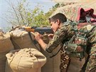 Na strái. Donedávna neznámé zkratky kurdských milic - YPG a enami tvoená YPJ...