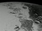 Sonda New Horizons poslala nové zábry Pluta.