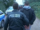 Nmetí policisté zadreli migranty