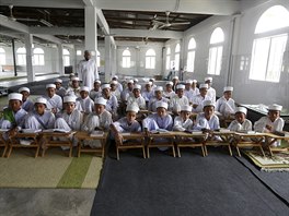Tahfiz or Koranic students pose for a photograph in Madrasah Nurul Iman...