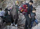 Afghántí uprchlíci dorazili na ecký Lesbos (12. íjna 2015).