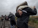 STANISLAV KRUPAŘ, volný fotograf: Běženci ze Sýrie na hranicích EU. Ze série...