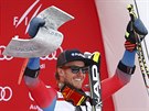 Ted Ligety slaví vítzství v obím slalomu v Söldenu.