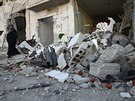 Následky bombardování ve mst Ma'arat an-Numán, které ovládají povstalci (21....