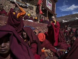 Tibetan Buddhist monks pray at Buddhist laymen lodge during the Utmost Bliss...
