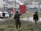 Izraeltí vojáci hlídkují na míst jednoho z palestinských útok, které jsou v...