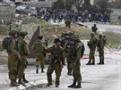 Izraelští vojáci hlídkují na místě jednoho z palestinských útoků, které jsou v...