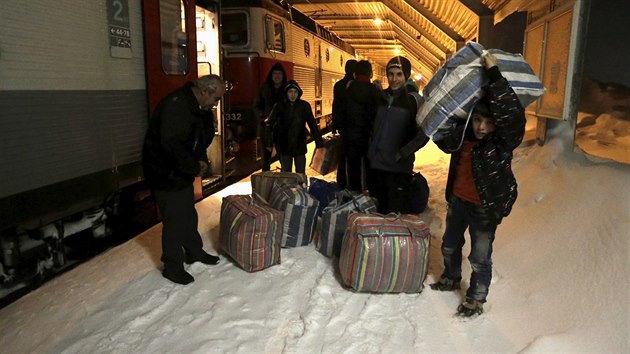 Migranti na severu Švédska ve městě Riksgransen. (19. prosince 2015)