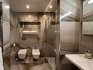 Koupelna je vybavená velkým sprchovým koutem, klozetem, bidetem a umyvadlem s...