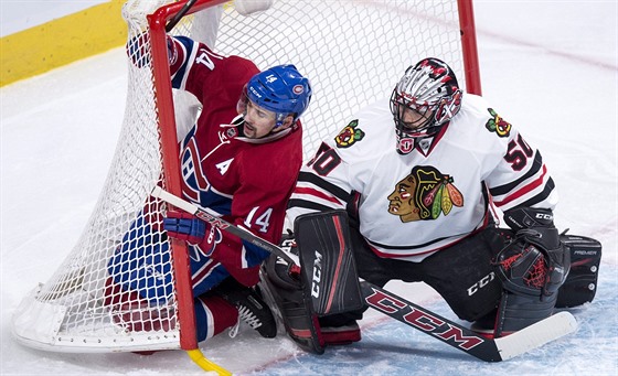 Tom Plekanec z Montrealu skonil v brance chicagskho Coreyho Crawforda.