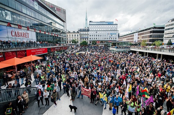 Vítání migrant ve Stockholmu (záí 2015)