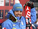 Italský lya Peter Fill se usmívá po absolvování slavného sjezdu v rakouském...