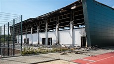 háský útok v srpnu 2015 zniil sportovní halu v Nauenu. Úady do ni plánovaly...