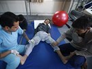 Syrtí uprchlíci v nemocnici ve mst Kilis na turecko-syrské hranici (9. února...