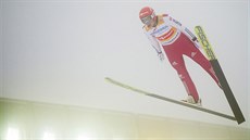 Eric Frenzel v závodu v severské kombinaci v Oslu.