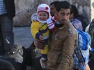 Boje v okolí Aleppa enou k turecké hranici novou vlnu uprchlík.
