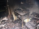 �ty�i jednotky hasi�� zasahovaly u po��ru domu v Malhotic�ch, uvnit� jedn� ze...