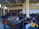 Migranti v pístavu Pireus u Atén. (10. bezna 2016)