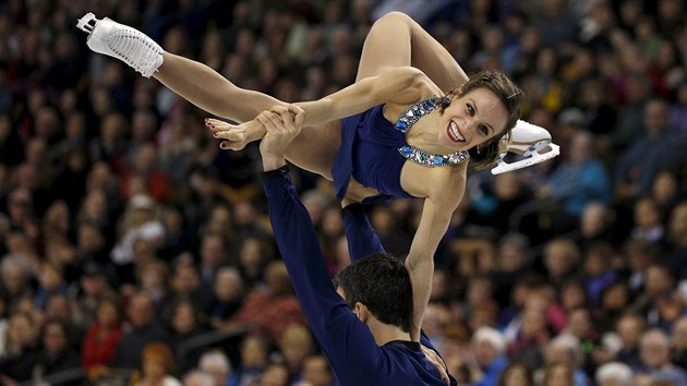 Meagan Duhamelov a Eric Radford bhem sv zlat jzdy na svtovm ampiontu v Bostonu.