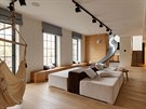 Obývací pokoj poskytuje rozmanité druhy relaxaního posezení: sedací soupravu v...