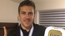 Richard Tesařík s pohárem pro vítěze mistrovství světa II. divize skupiny B,...