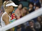 KOUE PORÁKU. Dánská tenistka Caroline Wozniacká pod vedením eského koue...