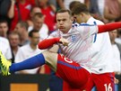 Anglian Wayne Rooney se rozcviuje ped utkáním proti Slovensku.