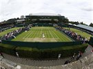 tvrtení dní na tenisovém Wimbledonu zachyceno agenturním fotografem.