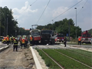 V Praze 8 se stetl nákladní vz s tramvají (27.7.2016).