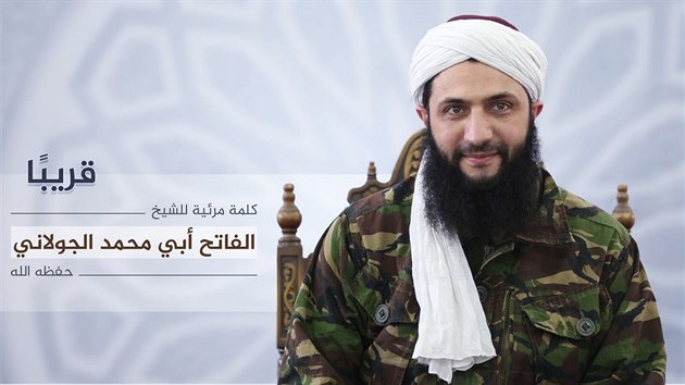 Vdce syrsk fronty an-Nusra ab Muhammad Dln na snmku z videa, kterm skupina oznmila peruen kontakt s al-Kidou. 