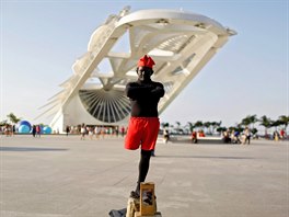 Erinaldo Cardoso, a 43-year-old street performer, poses for a portrait in...